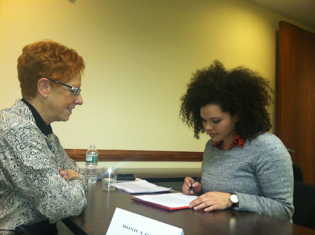 WNBA-NYC member Linda Rosen discussing her novel with agent Monica Odom.